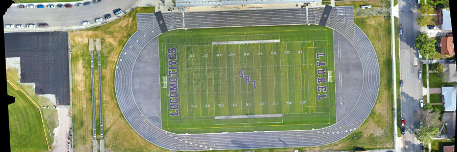 Top-down orthophoto map of a high school and athletic field